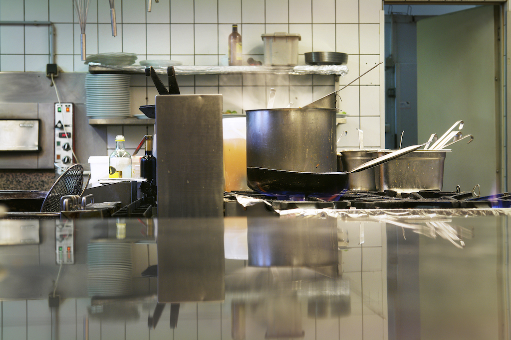 Commercial kitchen that could flood if commercial Plumbing Services are ignored.