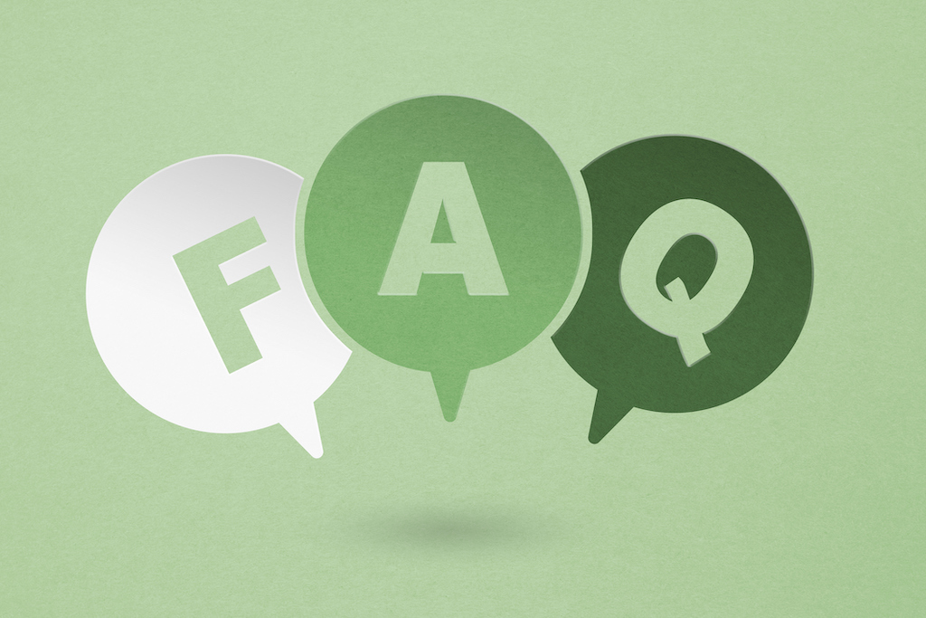 Green background with FAQ bubbles. | garbage disposal repair and installation