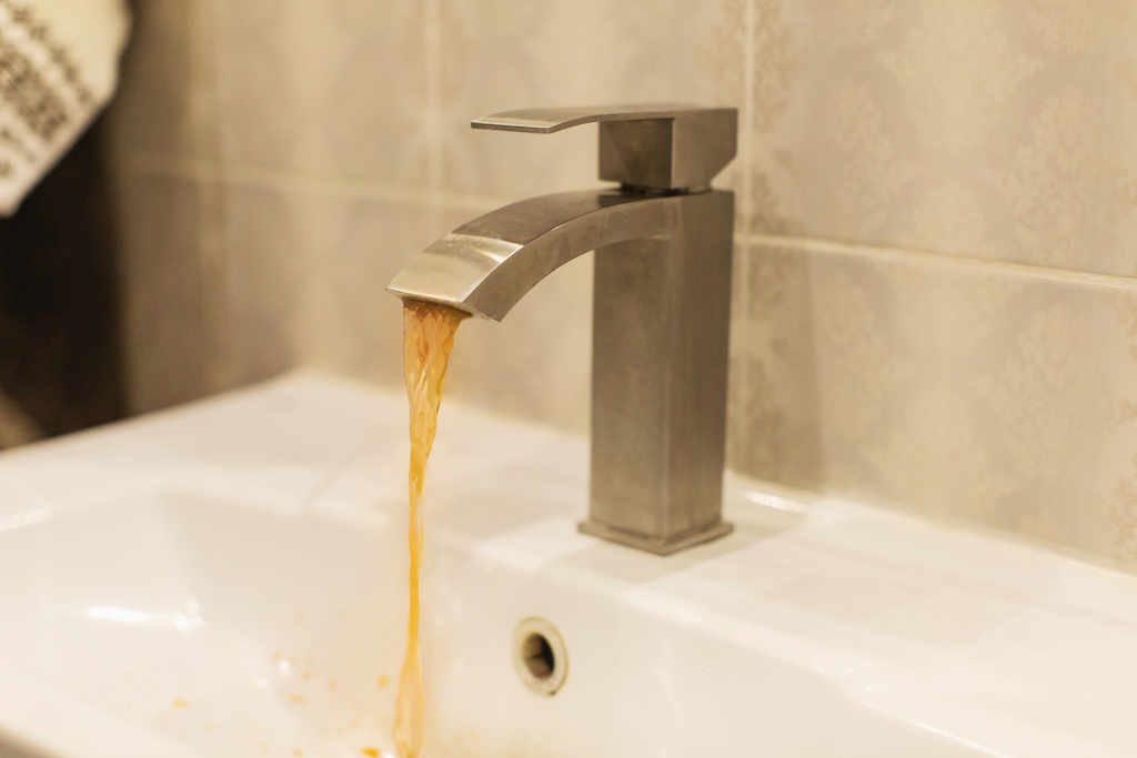 Dirty tap water coming out of bathroom sink. | Backflow Prevention Testing