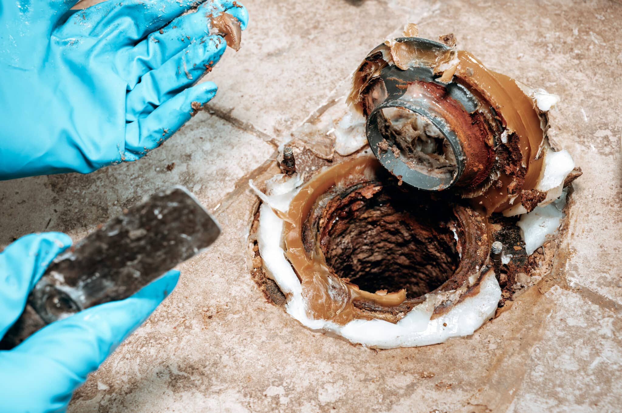 Toilet base area broken, Toilet flange repair.