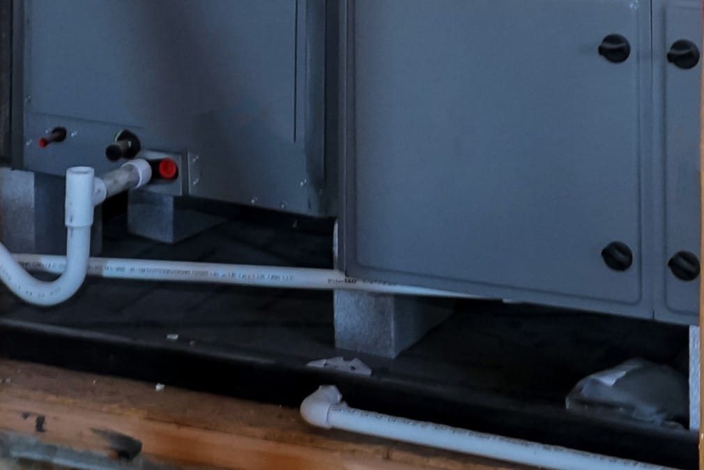 Condensate drain cleaning prevents ceiling stains.